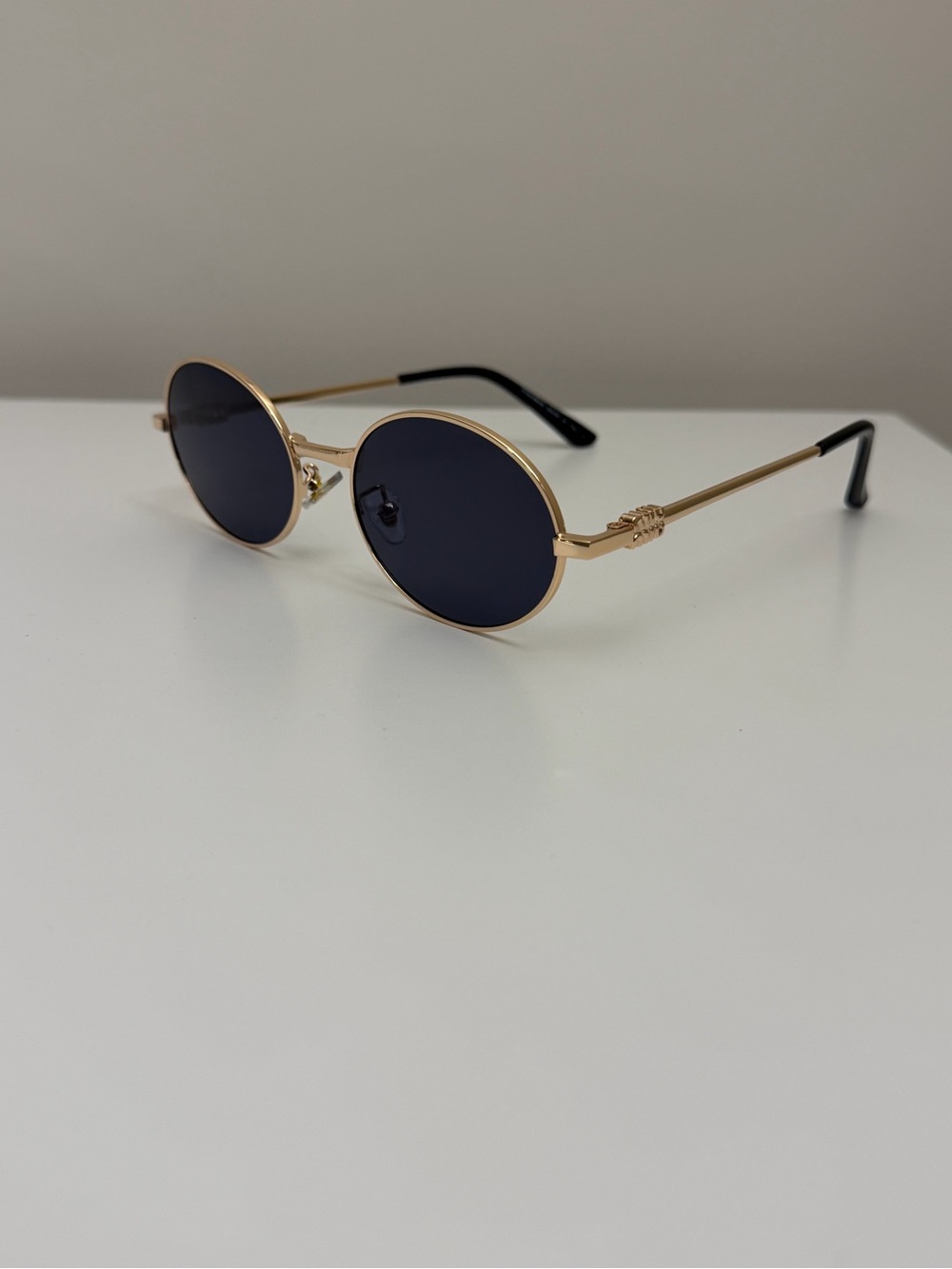 MIU MIU Rose Gold Oval Sunglasses Black Lenses